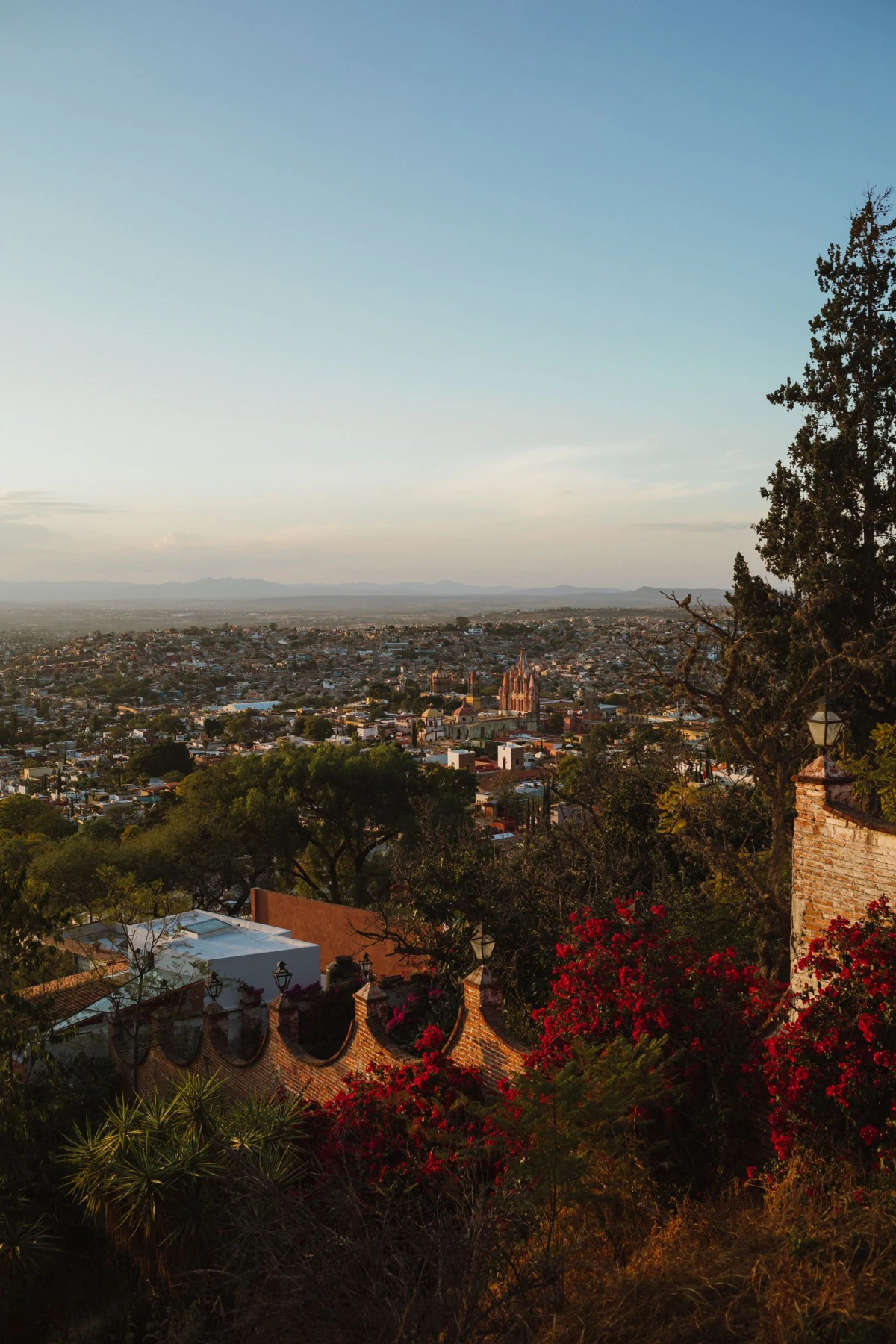 A panoramic view across San Miguel de Allende in warm evening light